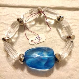 Artemis's Gems custom-made beaded bracelet with large blue gem